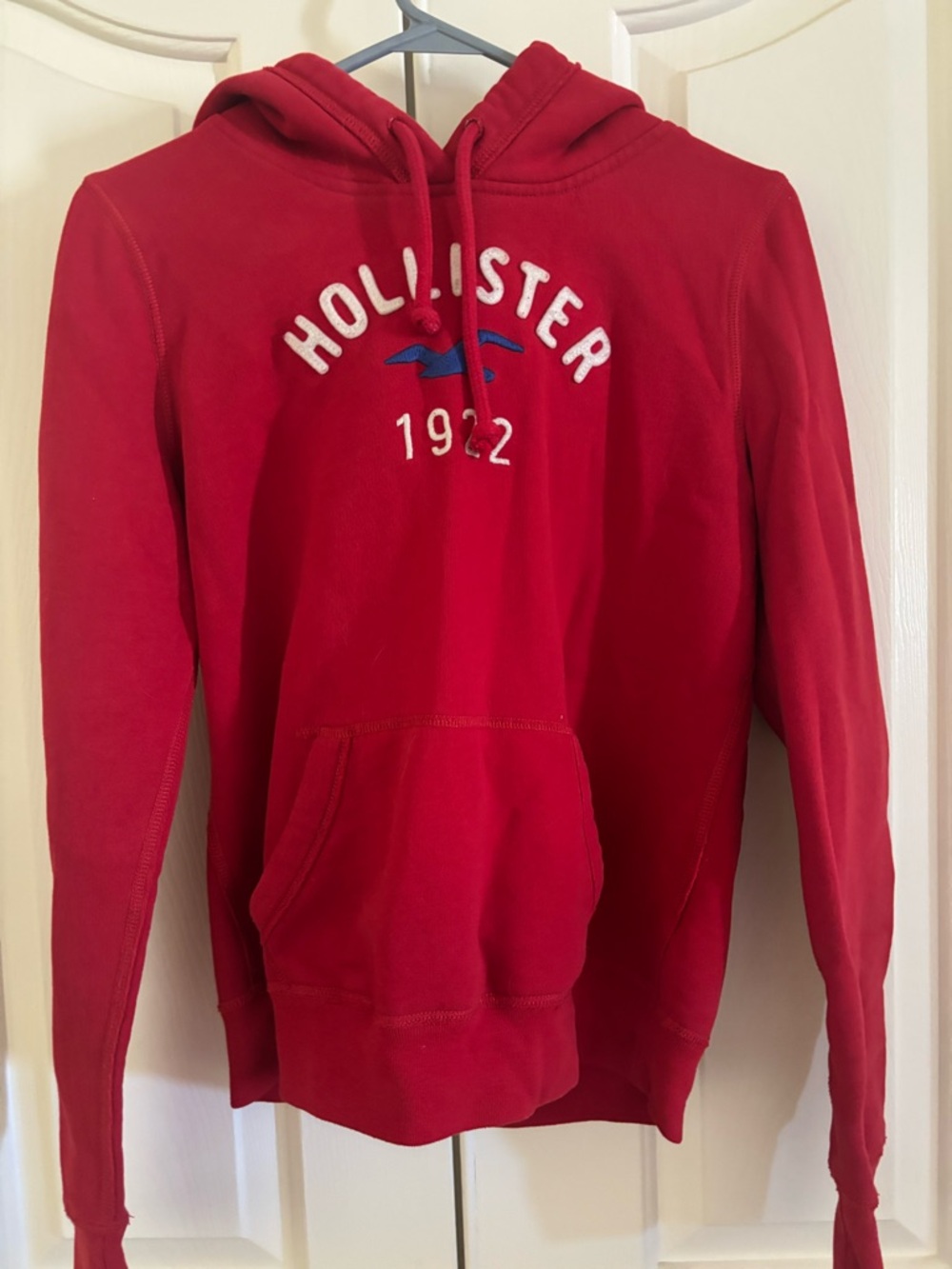 Hollister women’s Jr Red Crewneck Hoodie with Blue Logo